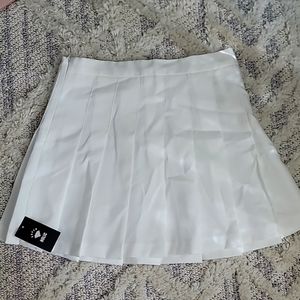 White pleated mini skirt